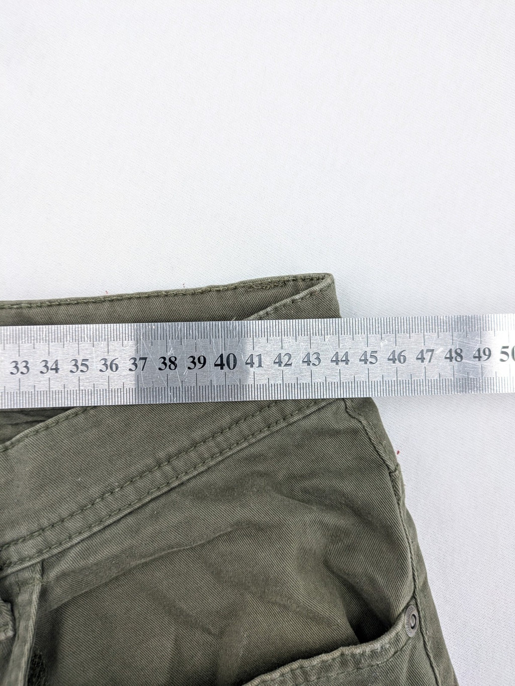 Canda khaki straight jeans 5-pocket design with stretch cotton material.