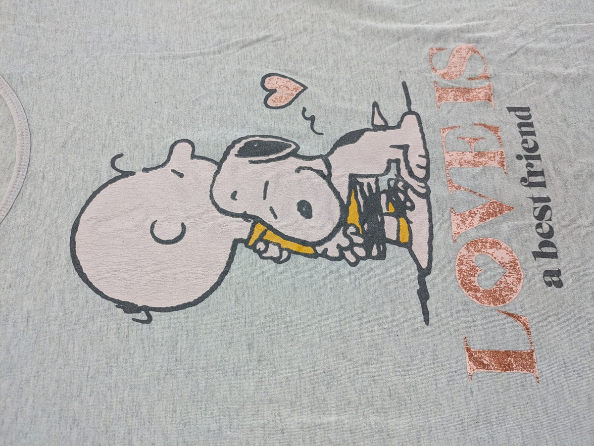 Peanuts brown vintage top with Snoopy and Charlie Brown illustration, rose gold text.