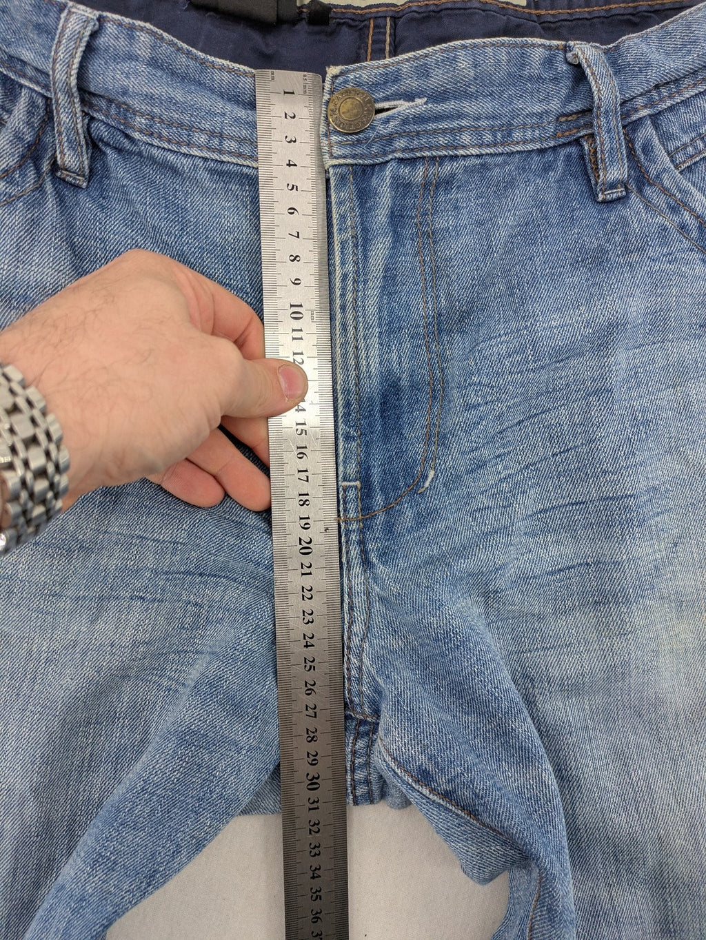 C&A blue straight jeans 5-pocket style with logo and button closure.
