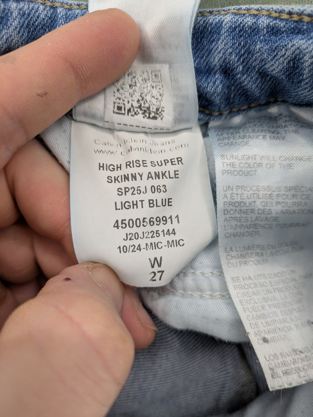 Calvin Klein Jeans blue high rise super skinny ankle jeans with logo patch and stretch material.