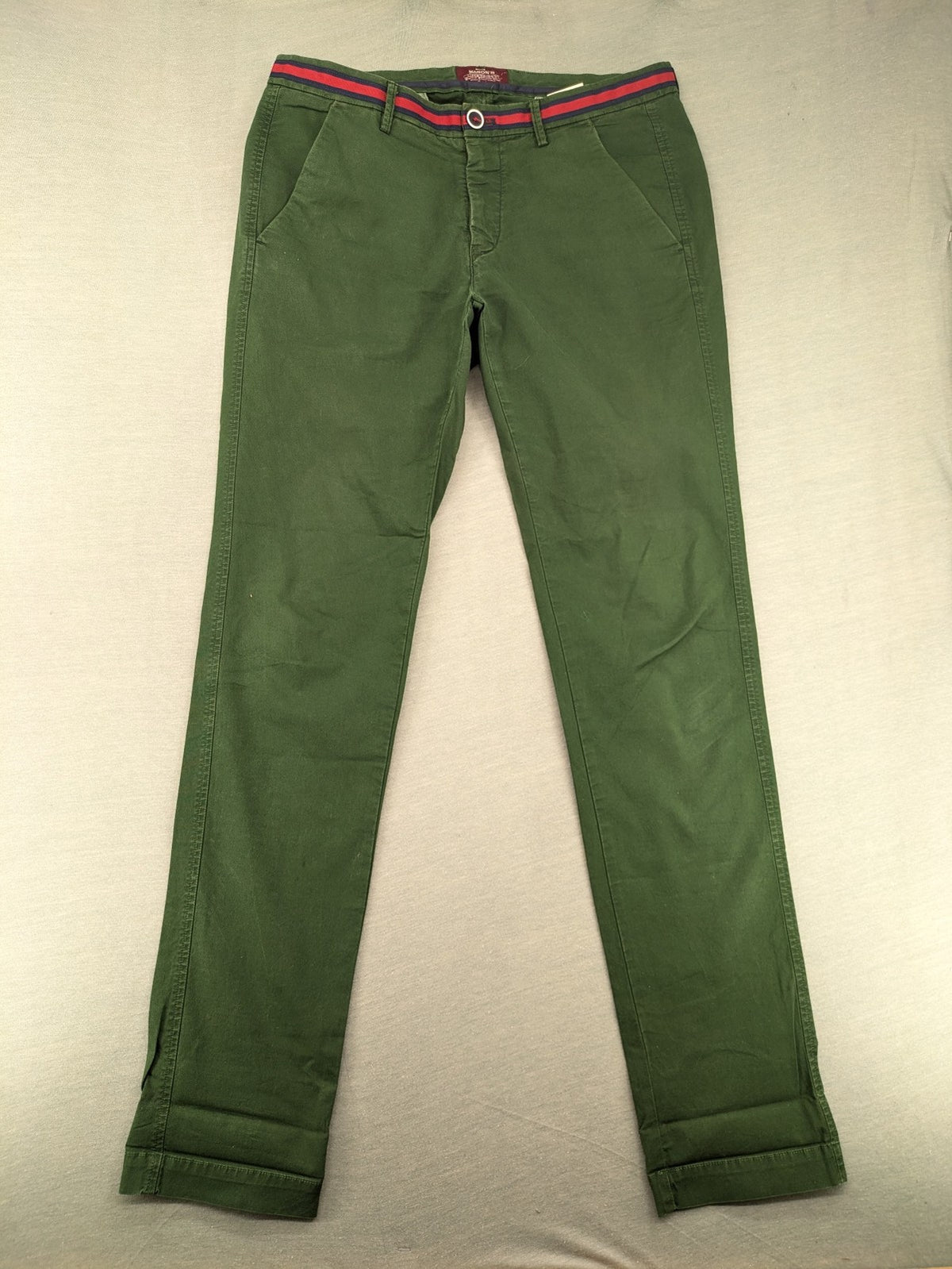 Mason's green chino pants with striped red and blue waistband, cotton stretch material.
