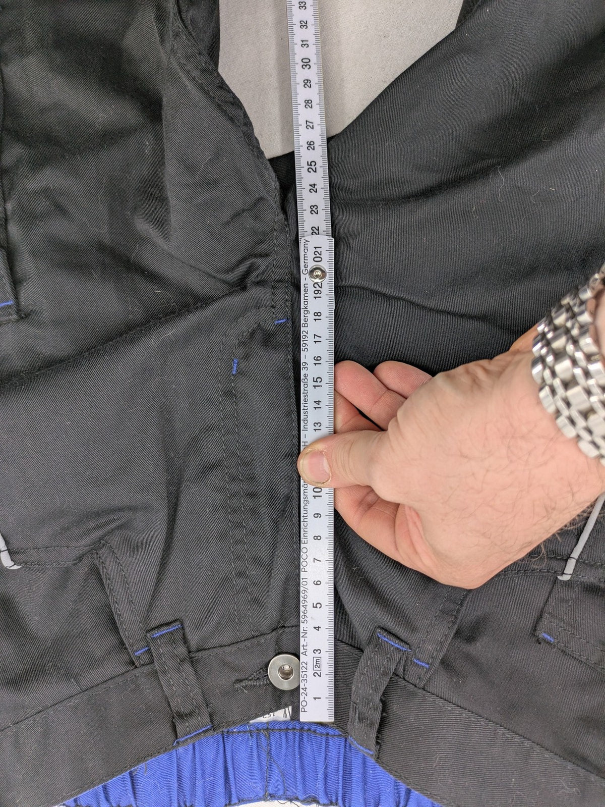 Powerfix Profi blue cargo pants with reflective stripes and side pockets, durable polyester-cotton blend.