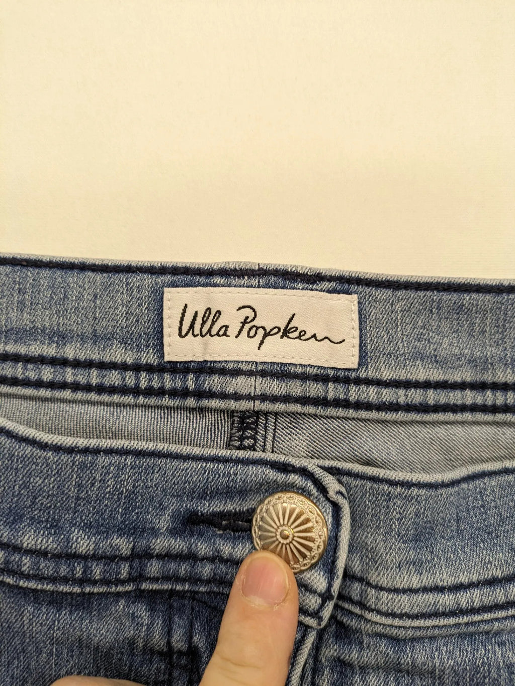 Angels blue straight jeans with five-pocket design and vertical front seams.