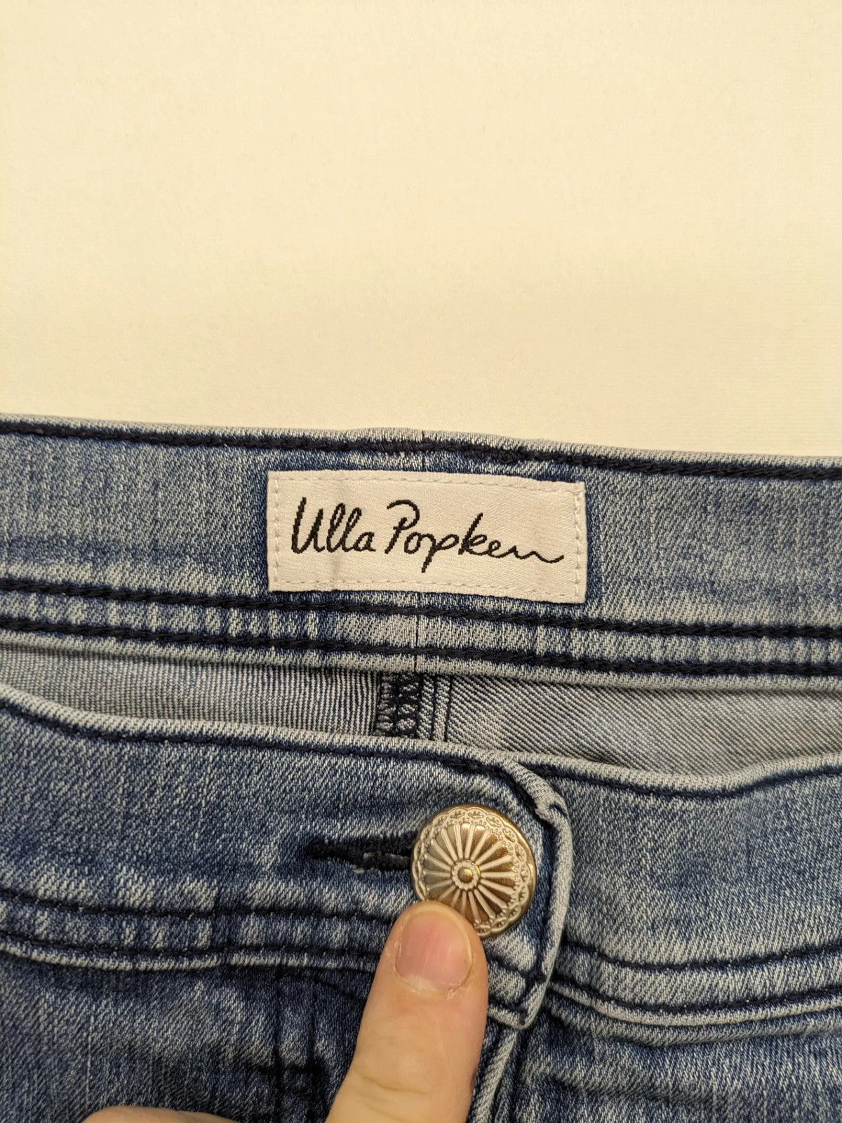 Angels blue straight jeans with five-pocket design and vertical front seams.