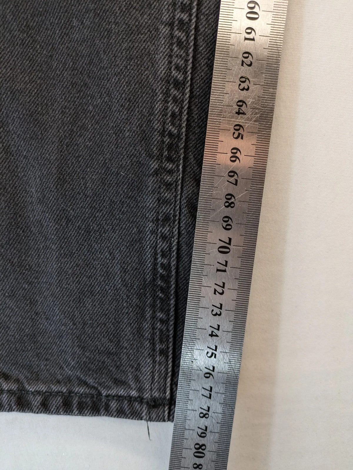 Jack & Jones grey loose fit jeans with classic button fly and 5-pocket design.