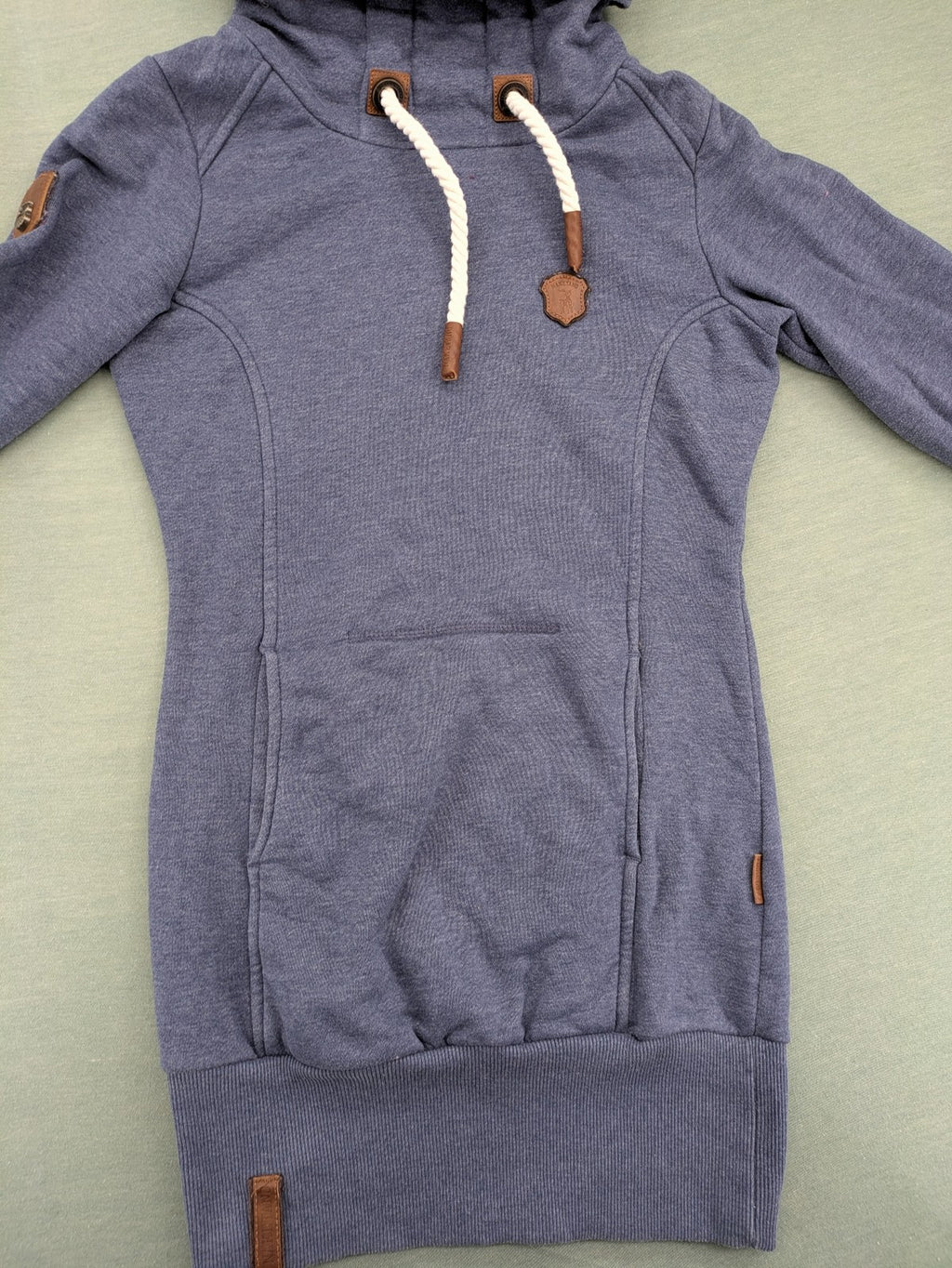 Naketano grey turtle neck jumper with thick drawstring and leather logo appliqué.