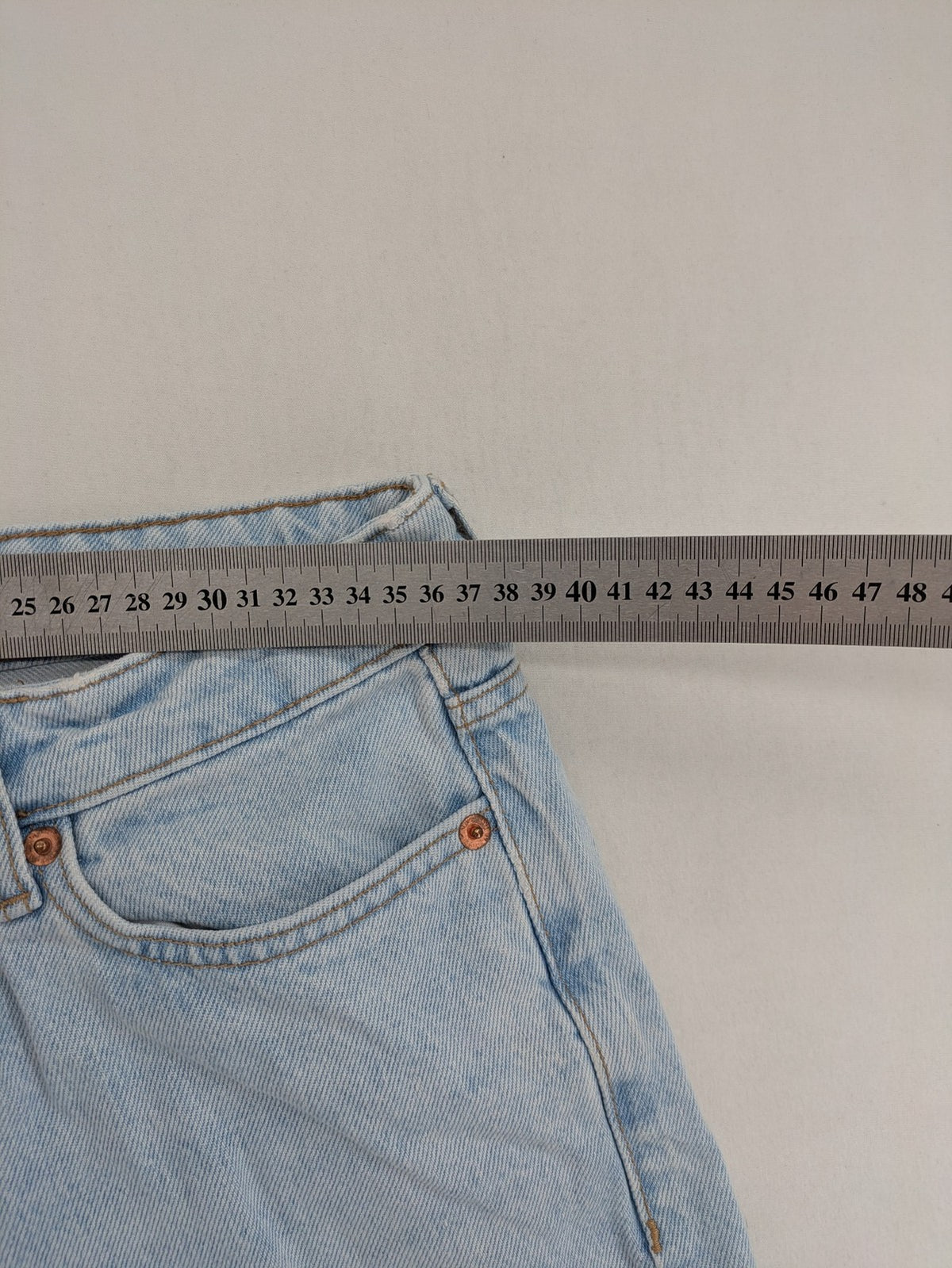 MNG blue high waist mom jeans with raw hem and five-pocket style.