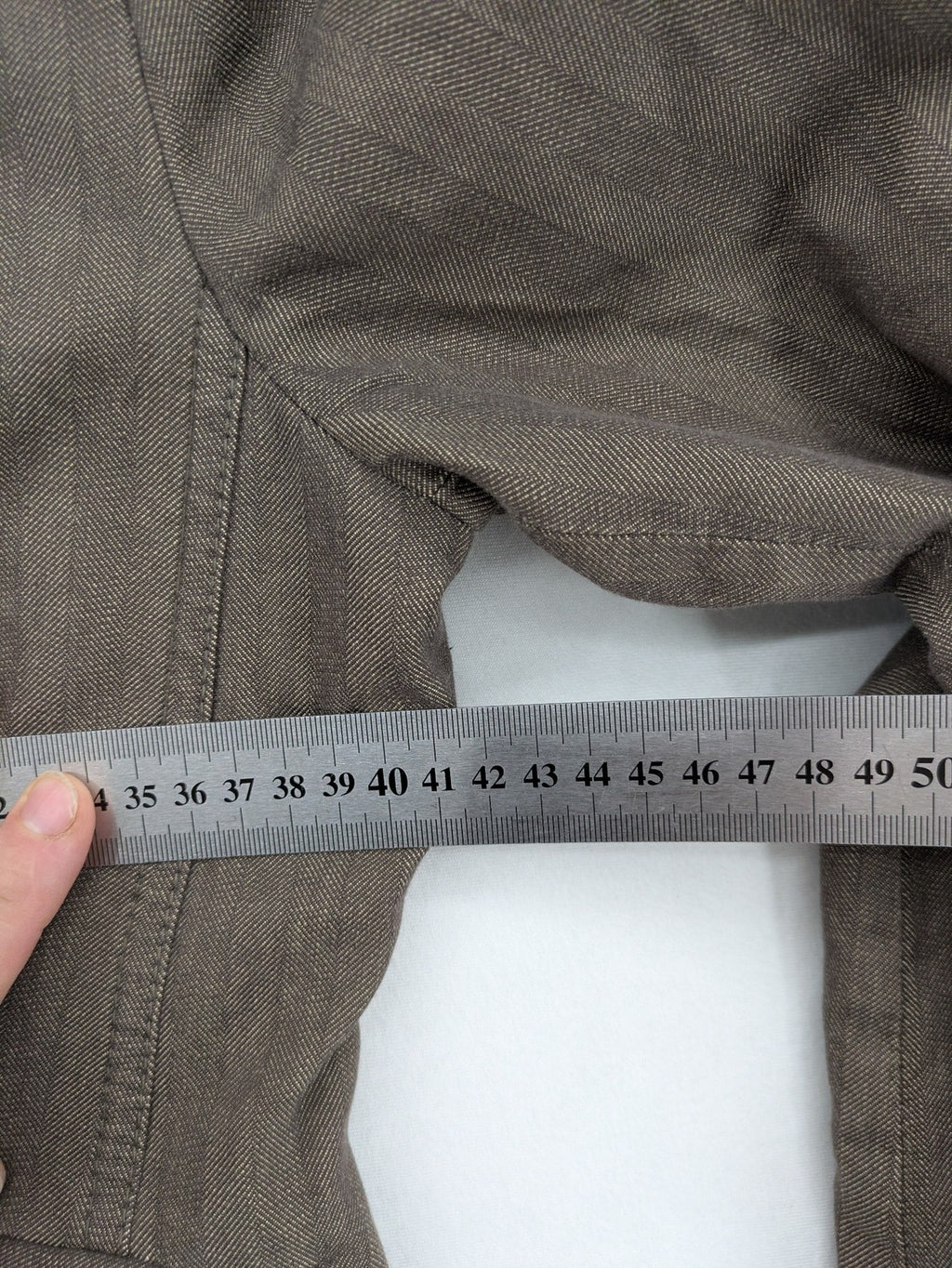Esprit brown blazer jacket with three-button front and notch lapel, made of cotton.