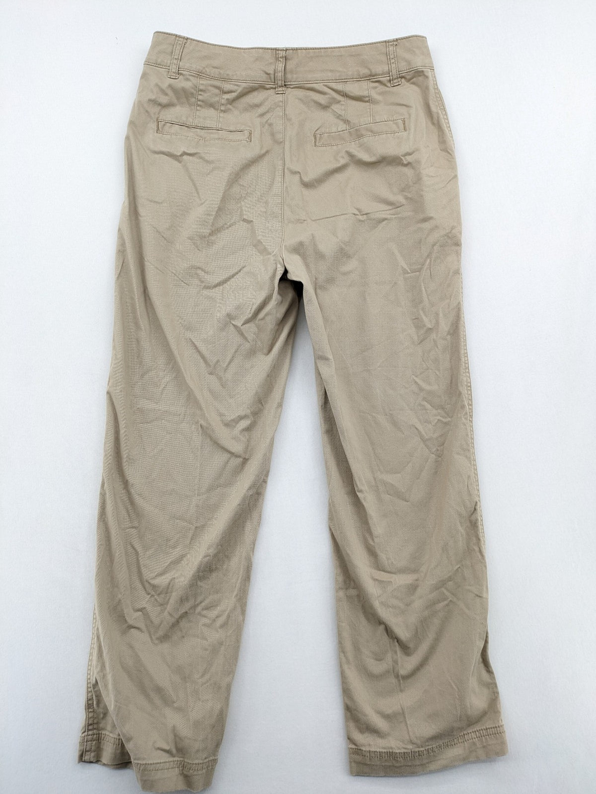 Gap beige girlfriend chino pants with relaxed fit and soft cotton-stretch blend.