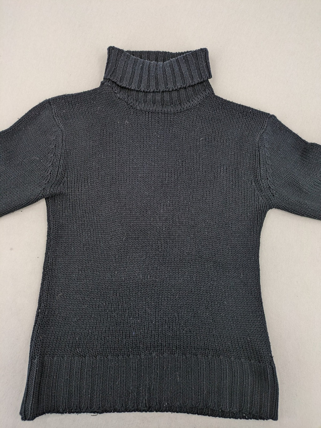 Fishbone grey turtle neck jumper with ribbed cuffs and soft acrylic knit material.