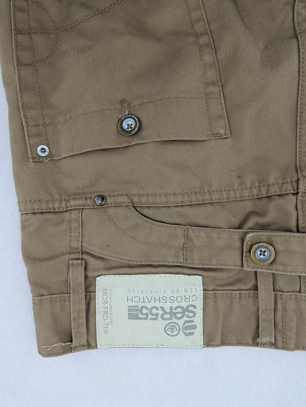 Crosshatch grey cargo pants with multiple pockets and durable cotton-polyester blend.