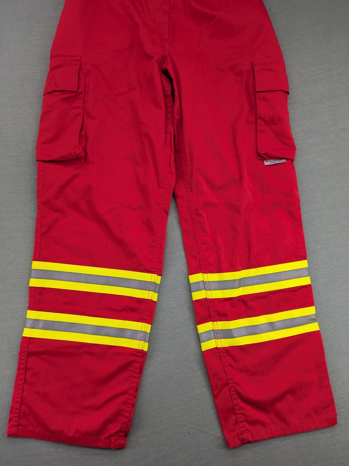 Bücking grey cargo work pants red accents with 3M Scotchlite reflective strips.
