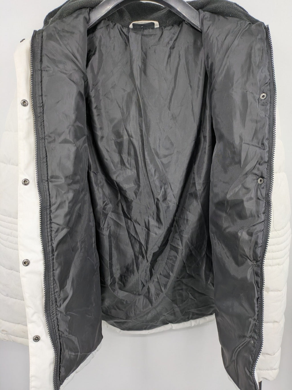 Janina white puffer jacket with quilted design and faux fur hood accents.