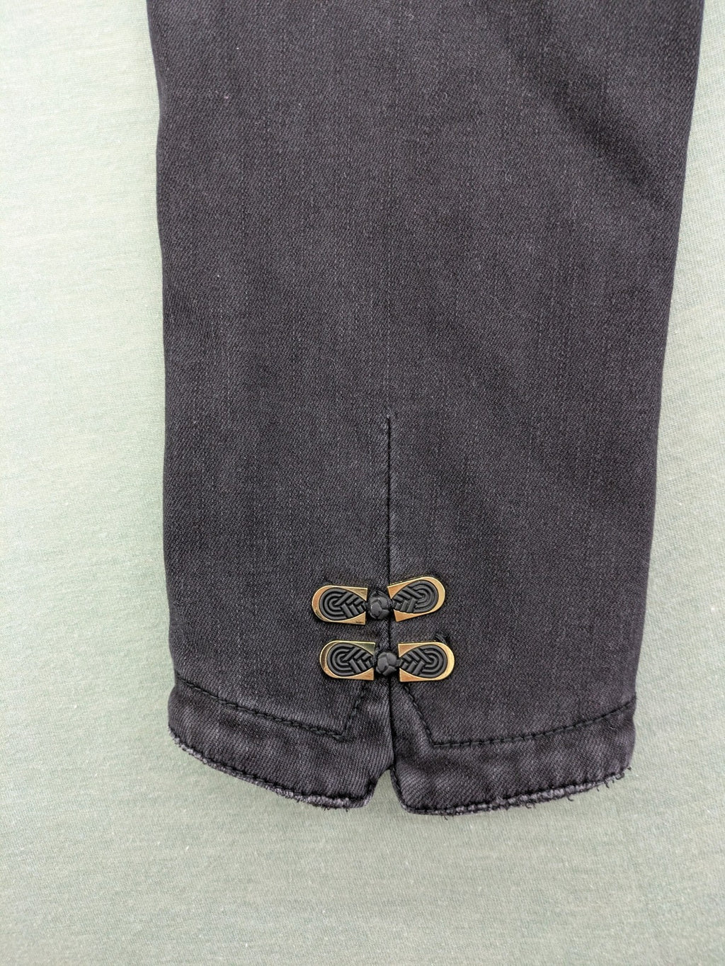 Disney black straight jeans with Minnie Mouse detail, cropped length, stretchy cotton blend.