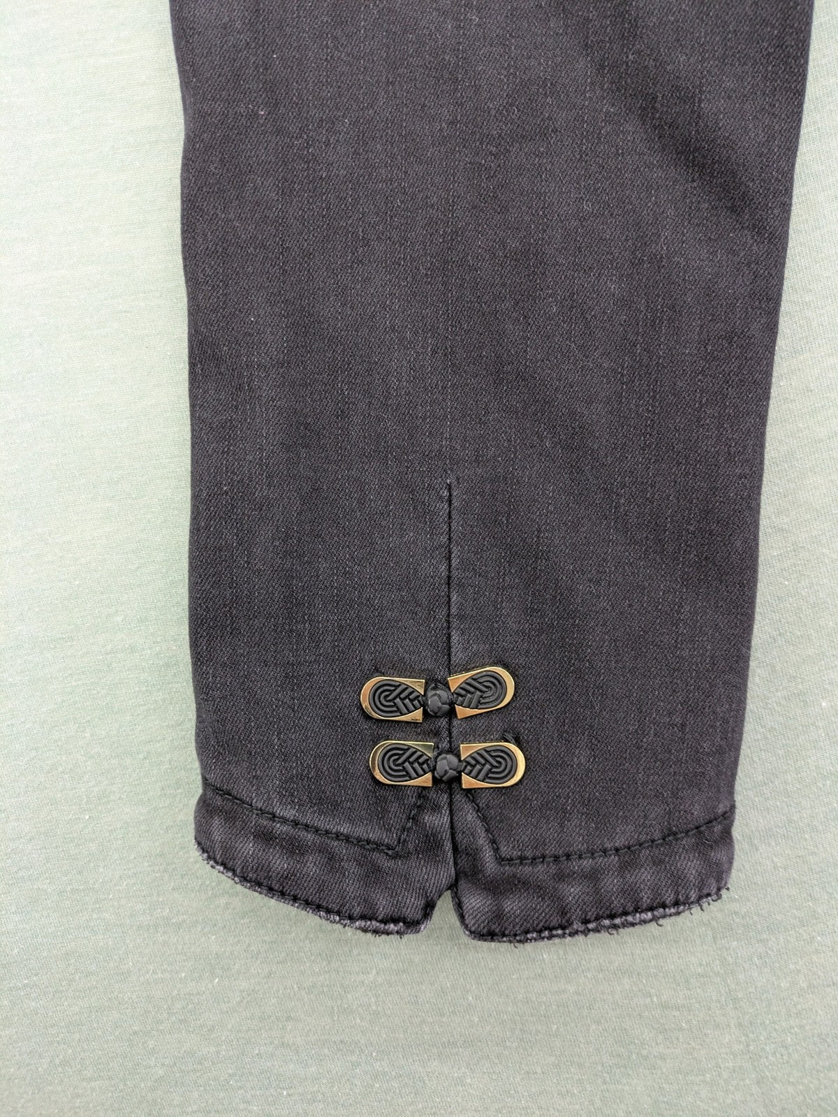 Disney black straight jeans with Minnie Mouse detail, cropped length, stretchy cotton blend.