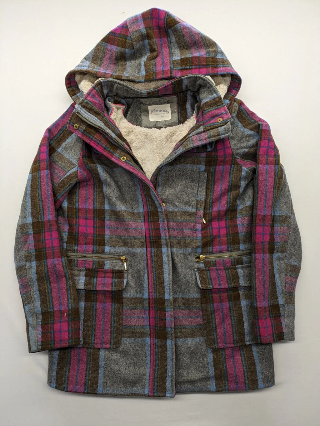 Johnnie B pink coat with gray check pattern, Sherpa lining, and zip closure.