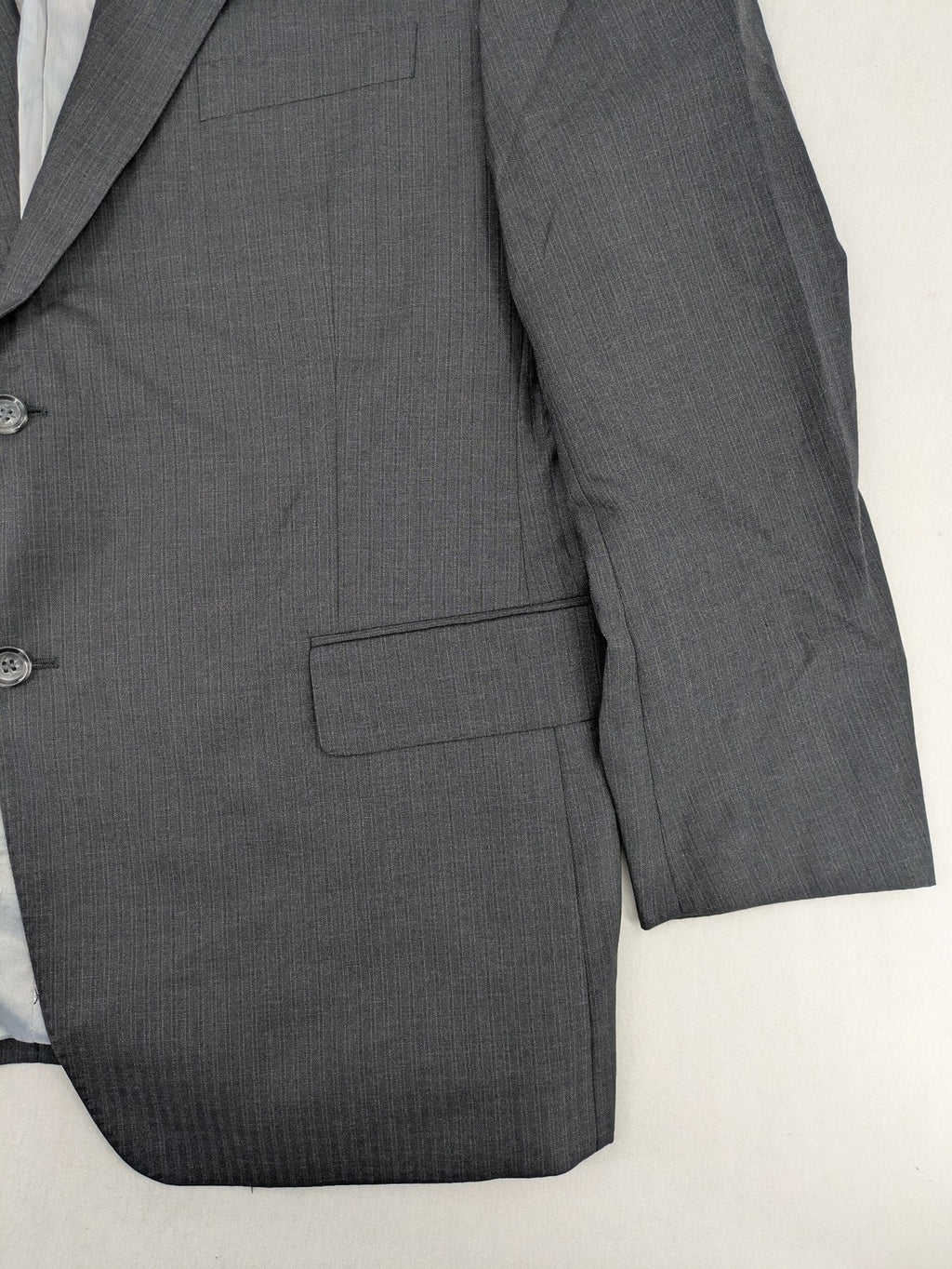 Desch grey blazer with dark grey pinstripe pattern, satin lining, and tailored design.