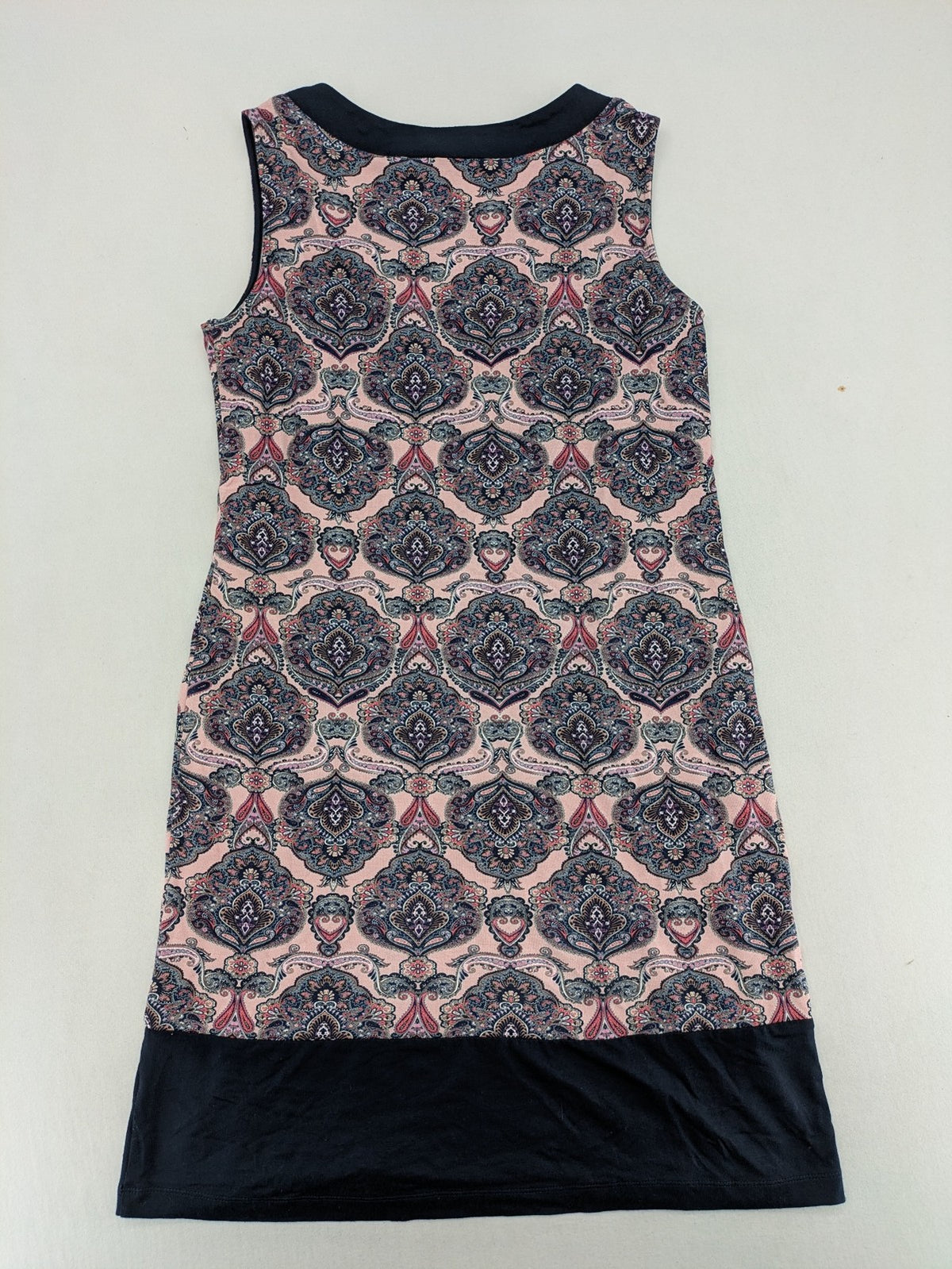 Montego pink sleeveless dress with paisley pattern and black hem, made of viscose.