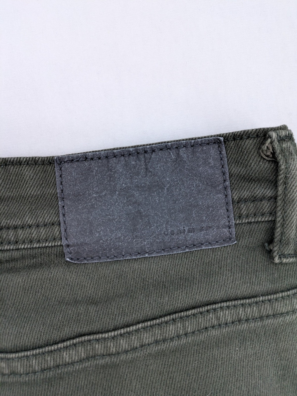 Denim & Co. green straight jeans 5-pocket design, cotton-stretch material.