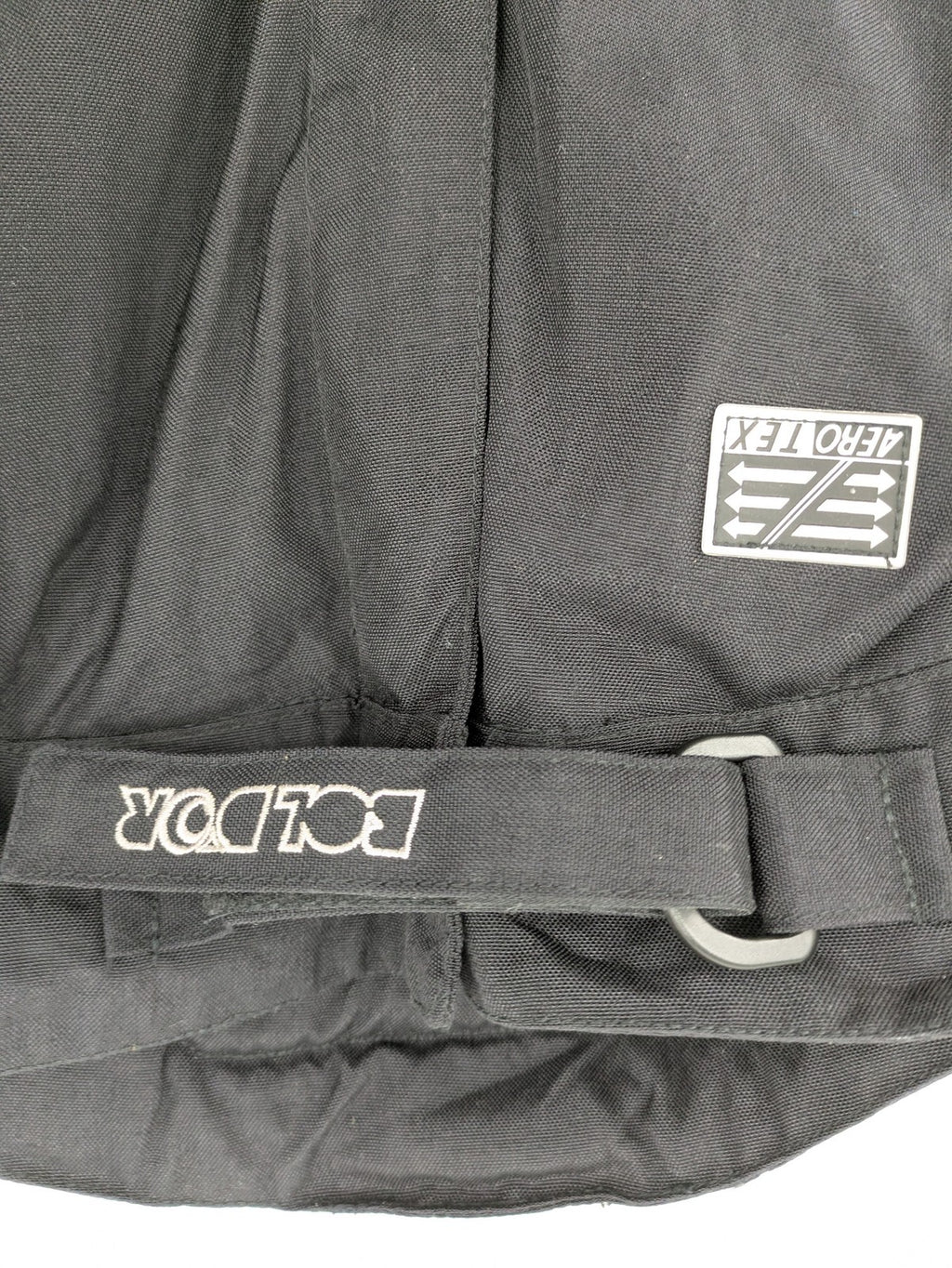 Aero black chaps Cordura fabric with ribbed knee inserts and adjustable waistband.