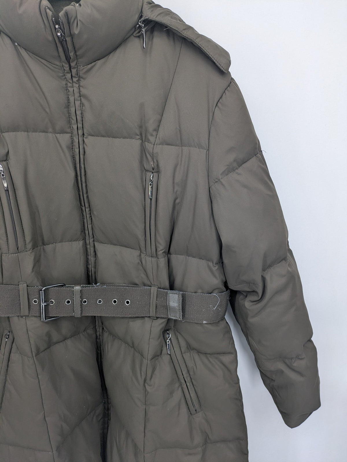 Yessica khaki puffer coat long quilted design with belt, zip pockets, and hood.