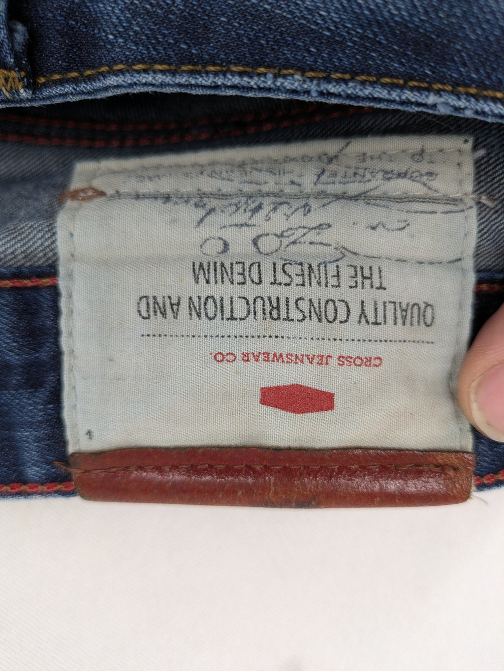 W32 blue straight jeans with classic 5-pocket design and dark wash denim.