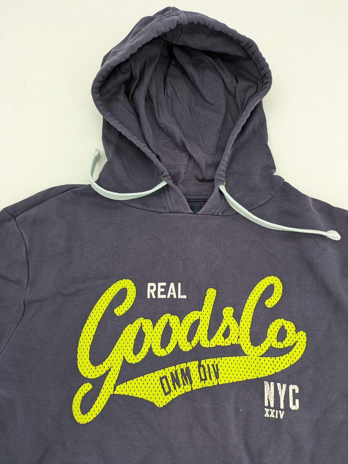 Angelo Litrico grey hoodie with neon green 'Real Goods Co NYC' graphic print and kangaroo pocket.