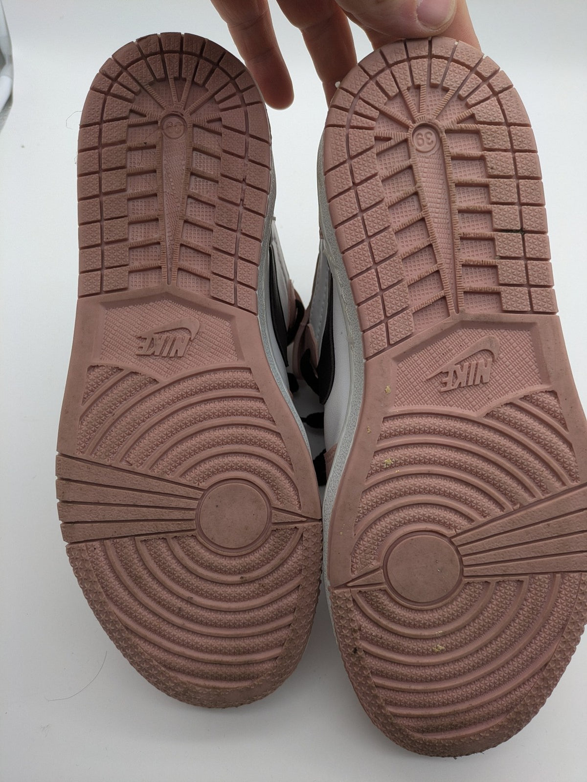 Nike Air Jordan high-top sneakers multi with Wings logo, Jumpman detail, and perforated toe.