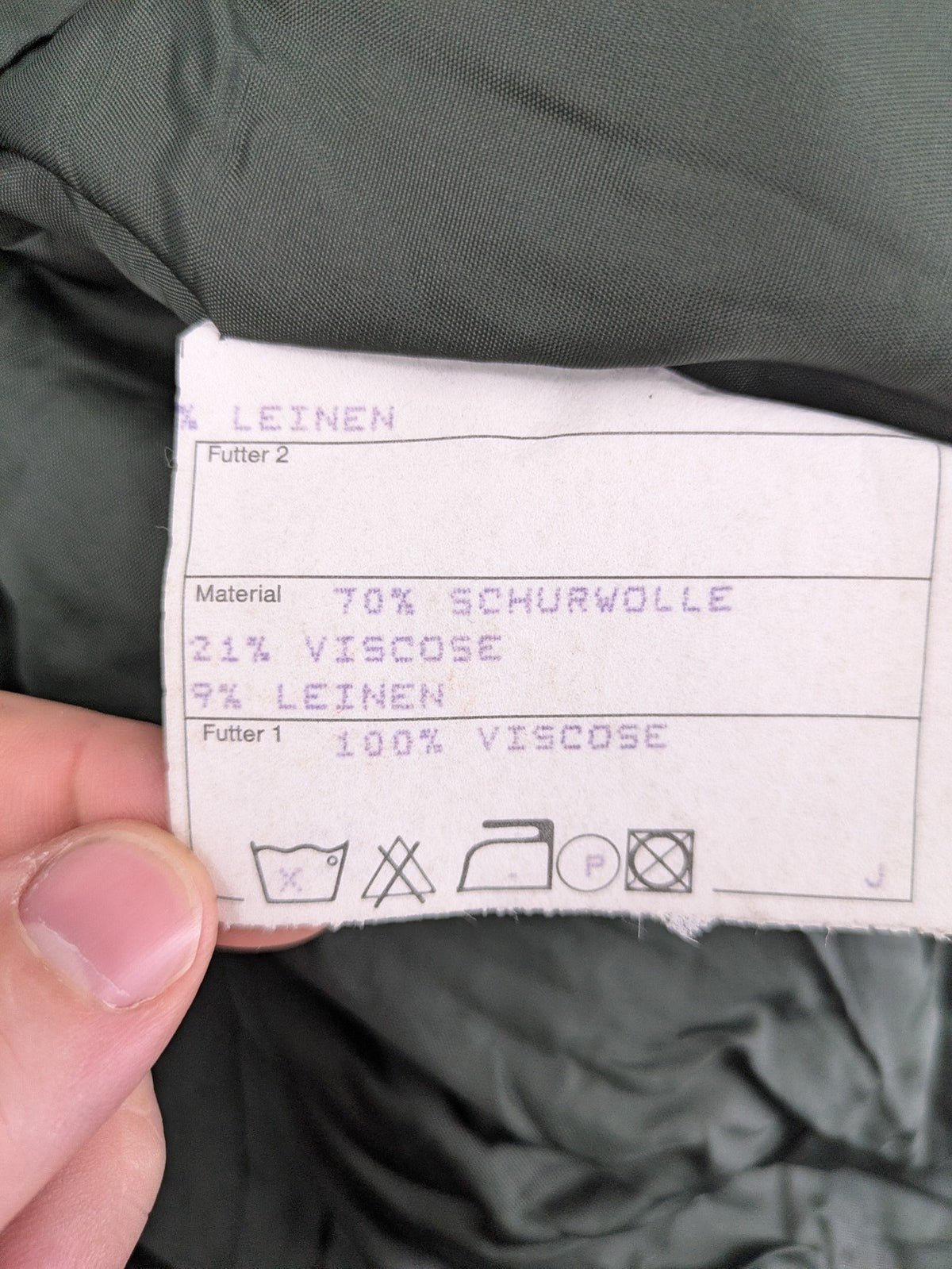 Traunsee Trachten green jacket with standing collar, decorative buttons, and premium wool-linen blend.