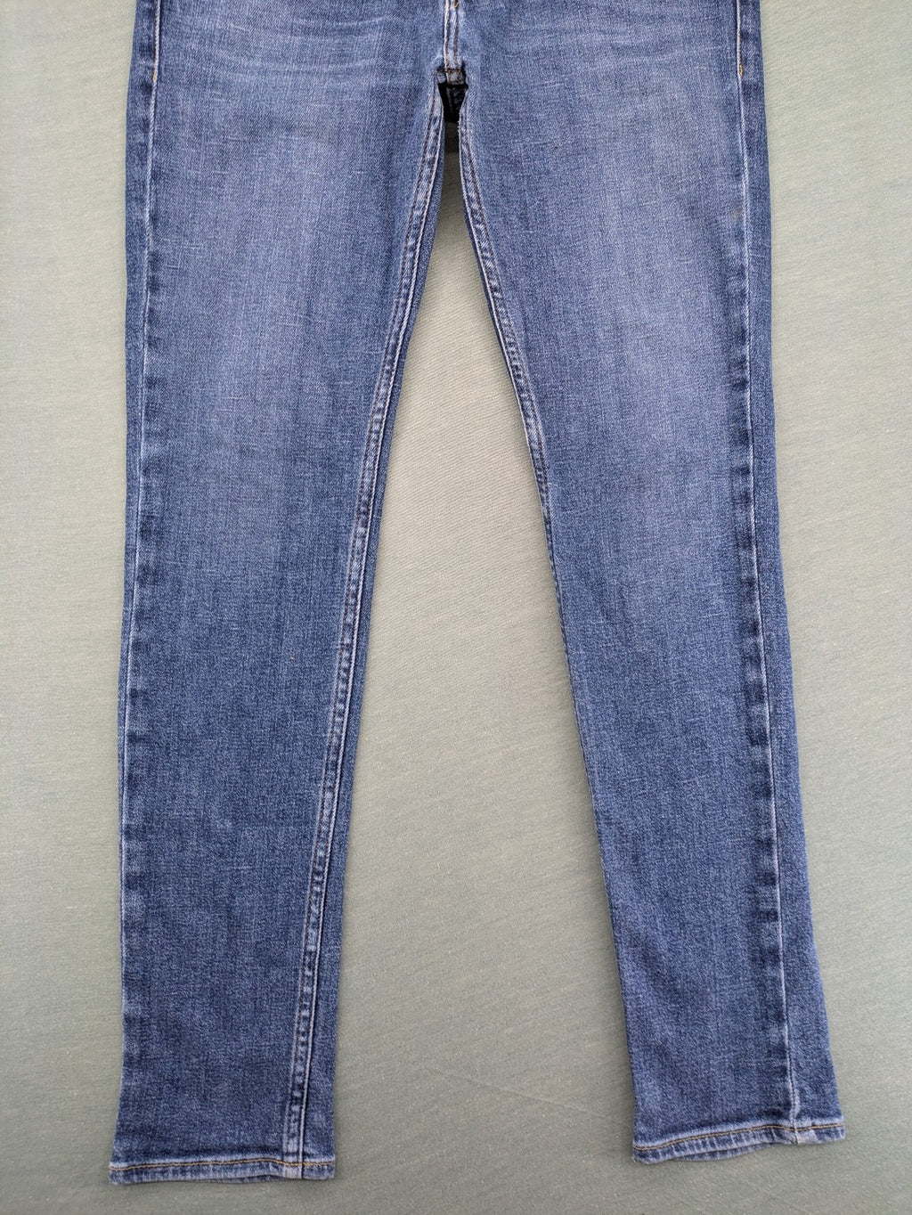 Hollister blue slim fit jeans with classic 5-pocket design and stretch denim material.