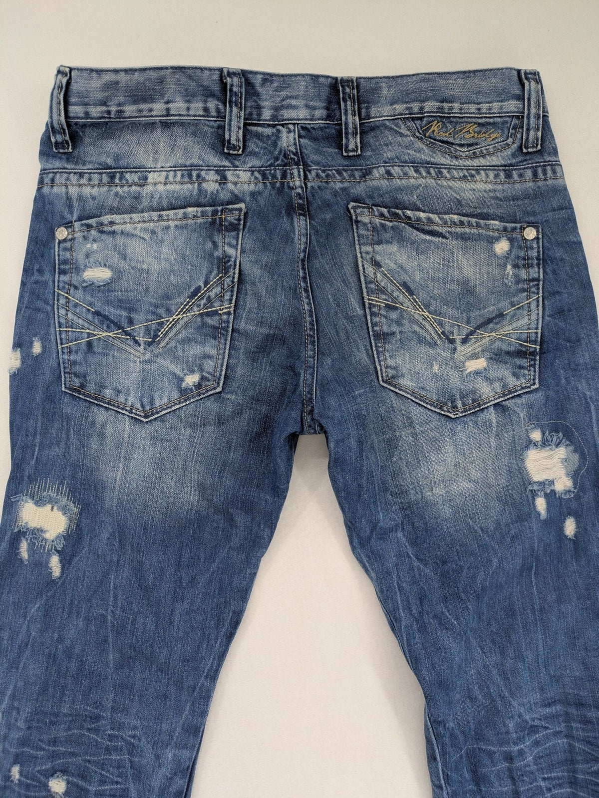 Red Bridge blue straight jeans distressed ripped design button fly five-pocket style