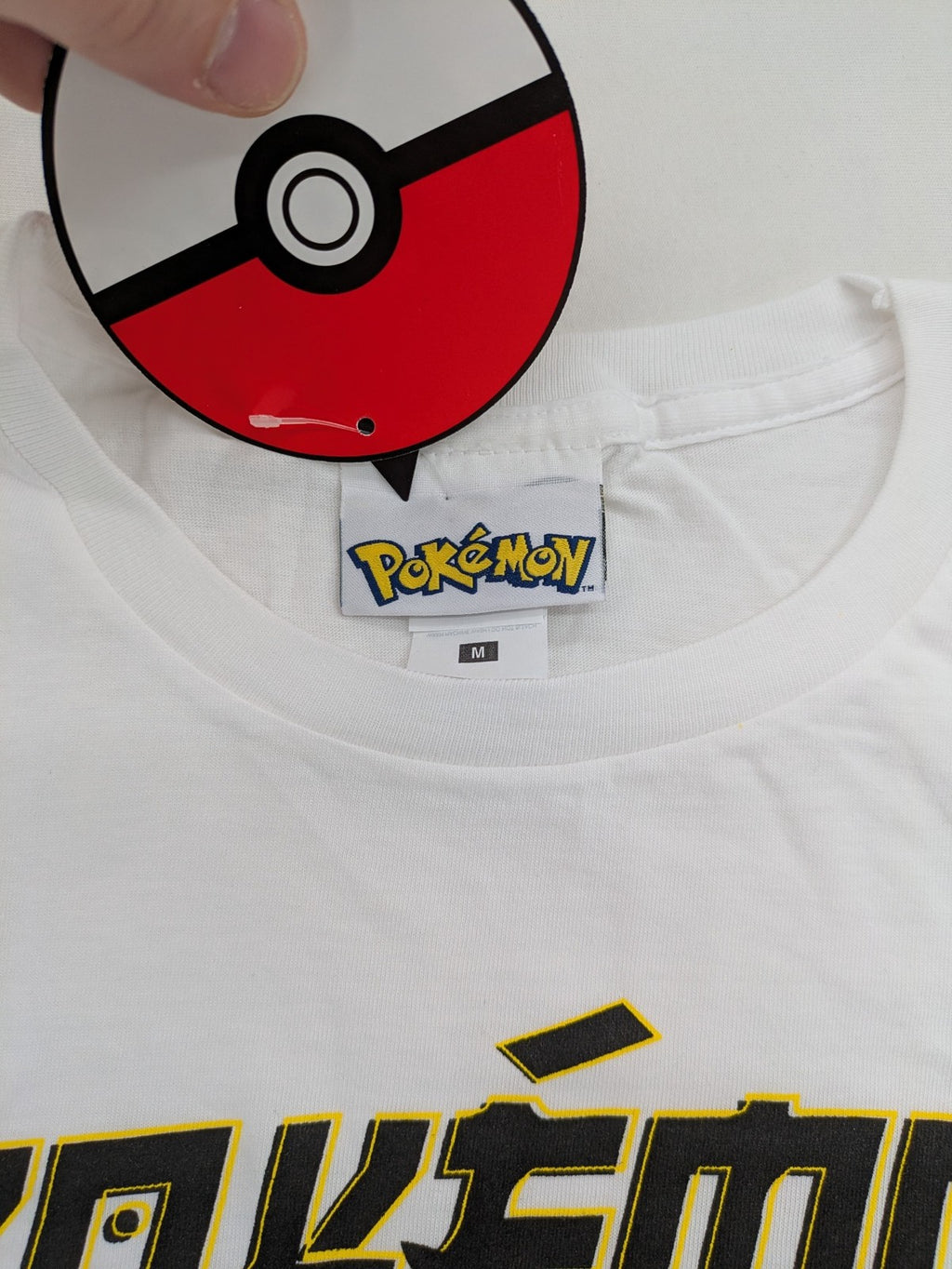 Pokémon multi graphic t-shirt featuring Pikachu, Glurak, Turtok, and Bisaflor in comic design.