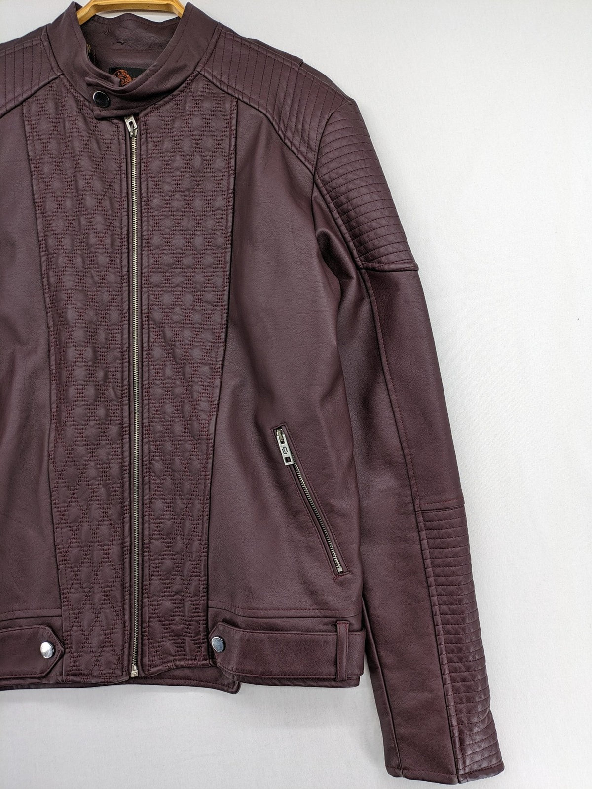 Leif Nelson burgundy biker jacket faux leather with quilted shoulder and sleeve details.