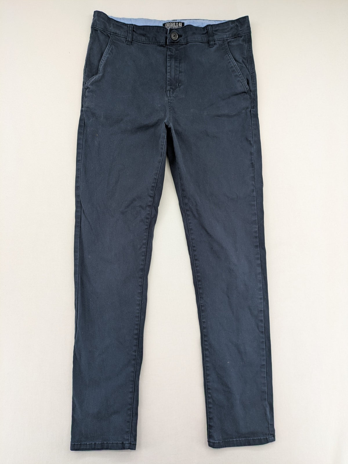 H&M navy chino pants with stretch, classic design, soft cotton blend material.