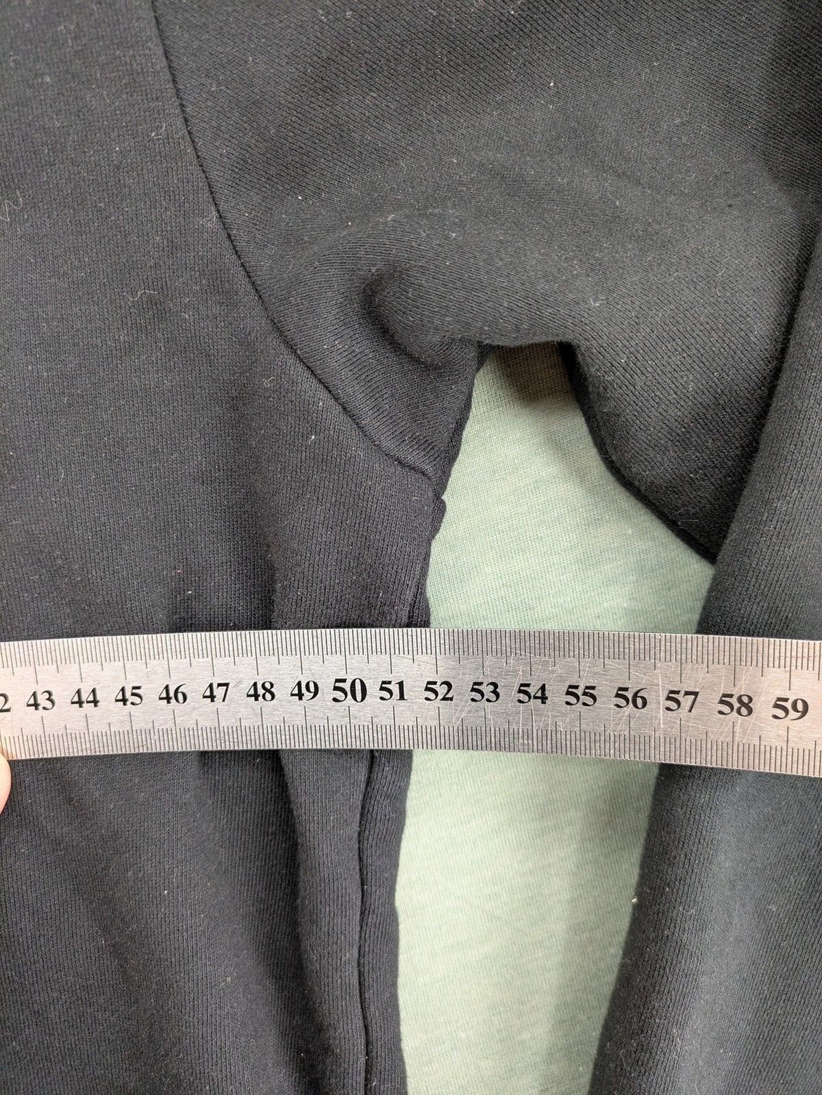 Ellesse grey hoodie with large logo, kangaroo pocket, and drawstring hood.