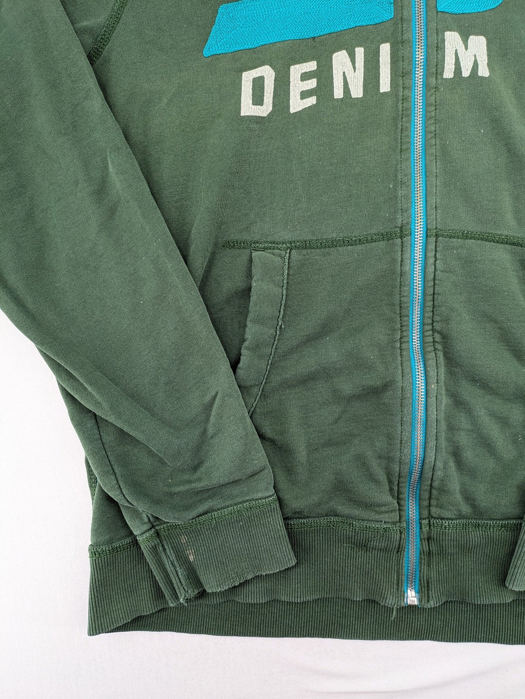 Tommy Hilfiger Denim green hoodie full zip with large graphic logo and grey waffle lining.