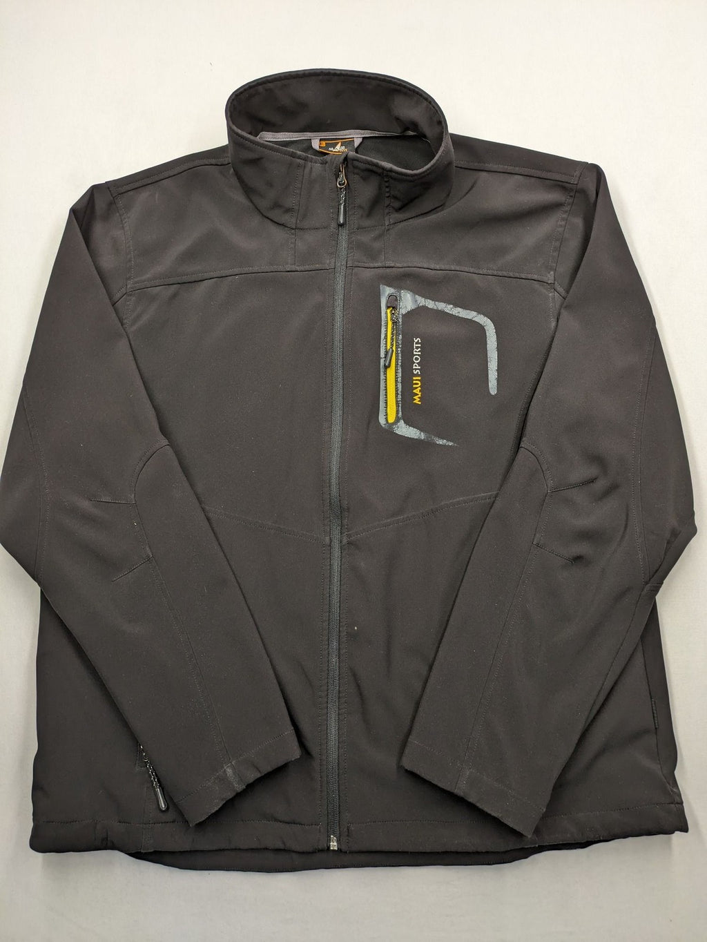 Maui Sports grey softshell jacket XL with contrasting yellow zipper and multiple pockets.