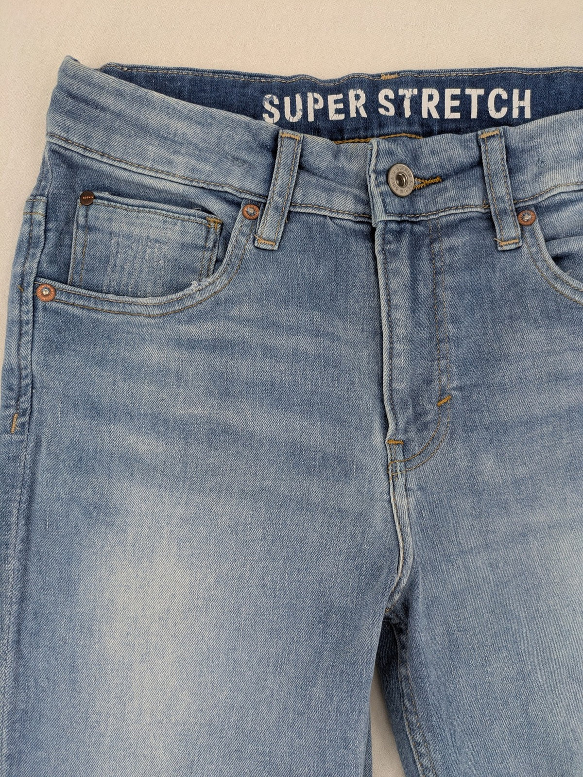 H&M blue skinny fit jeans, classic 5-pocket design, super stretch material.