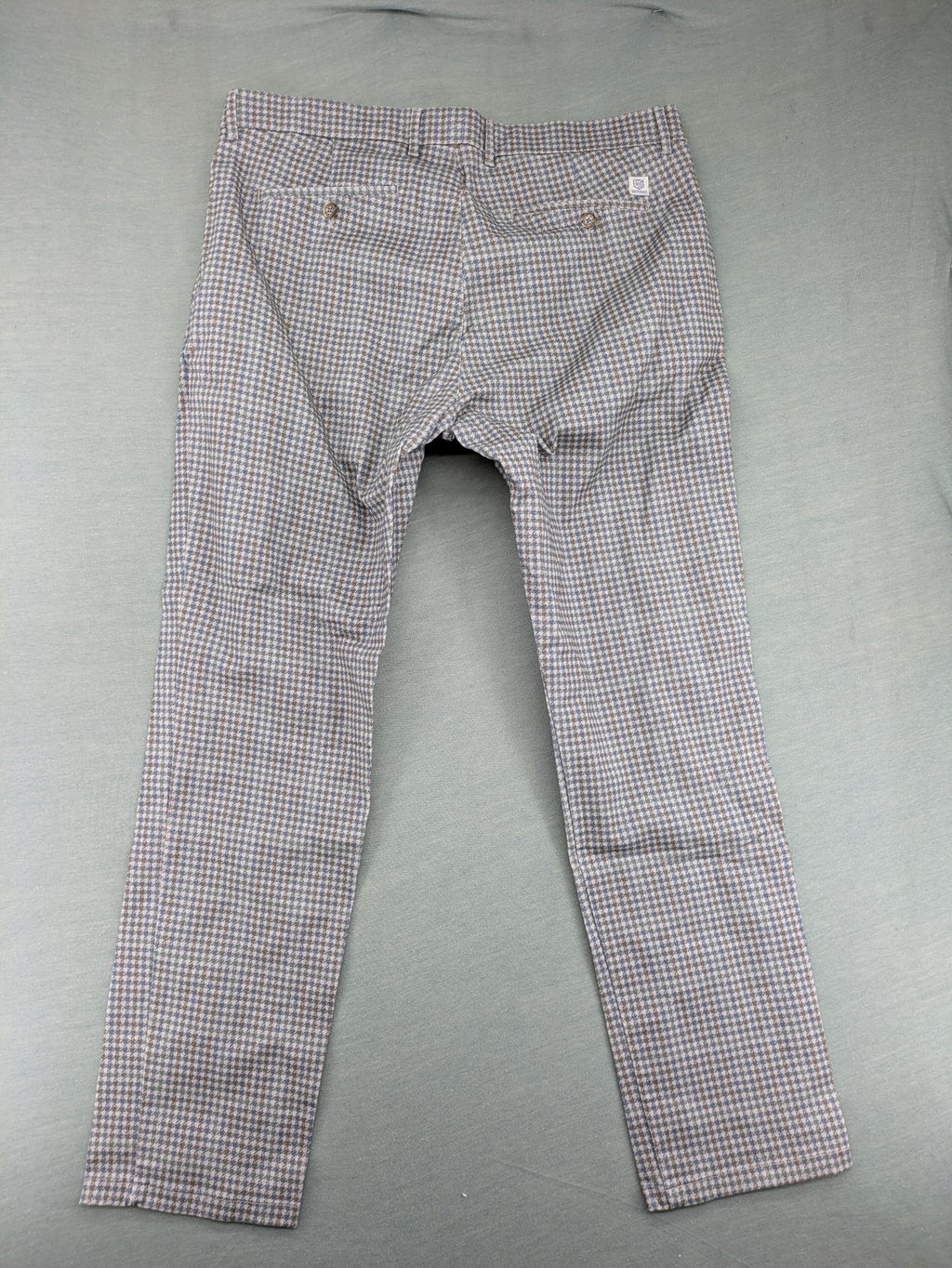 State of Art pink pants houndstooth pattern modern fit with zipper and button closure.