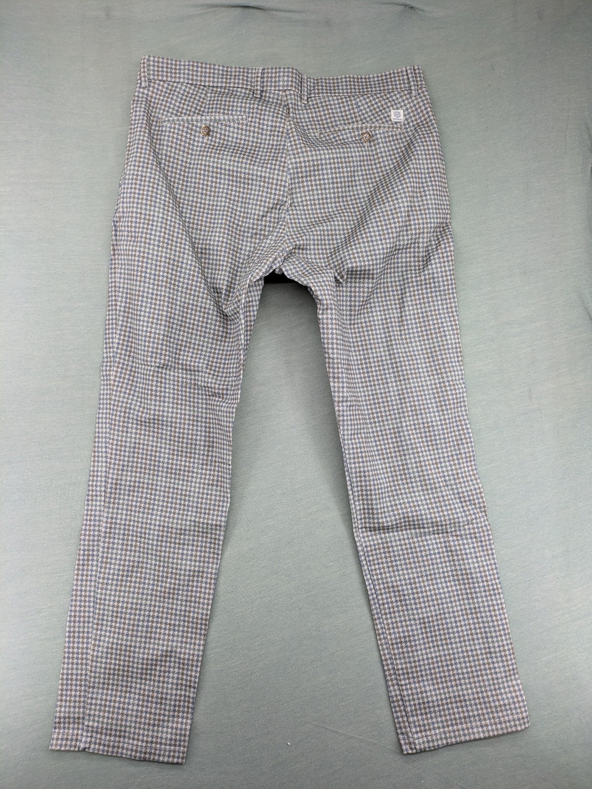 State of Art pink pants houndstooth pattern modern fit with zipper and button closure.