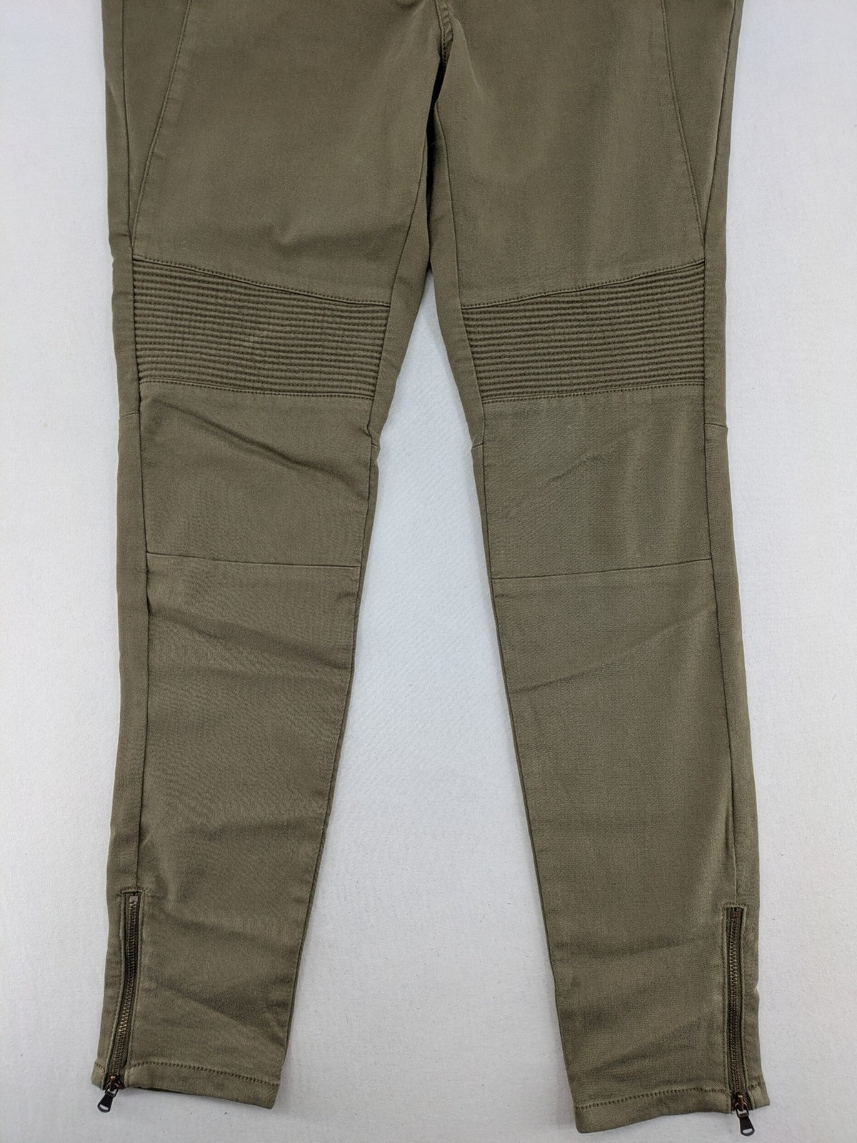 Clockhouse green moto jeggings with ribbed knee panels and ankle zippers.
