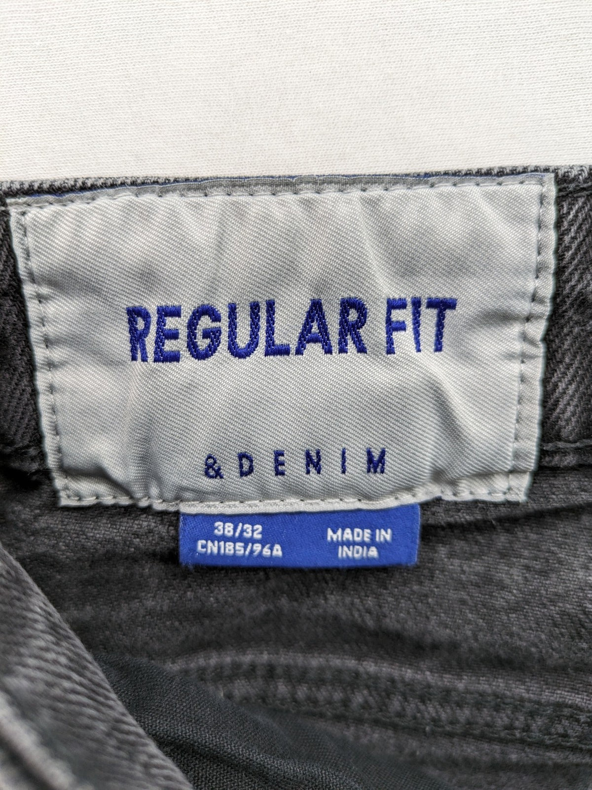 H&M grey straight jeans regular fit dark wash cotton blend with classic styling.