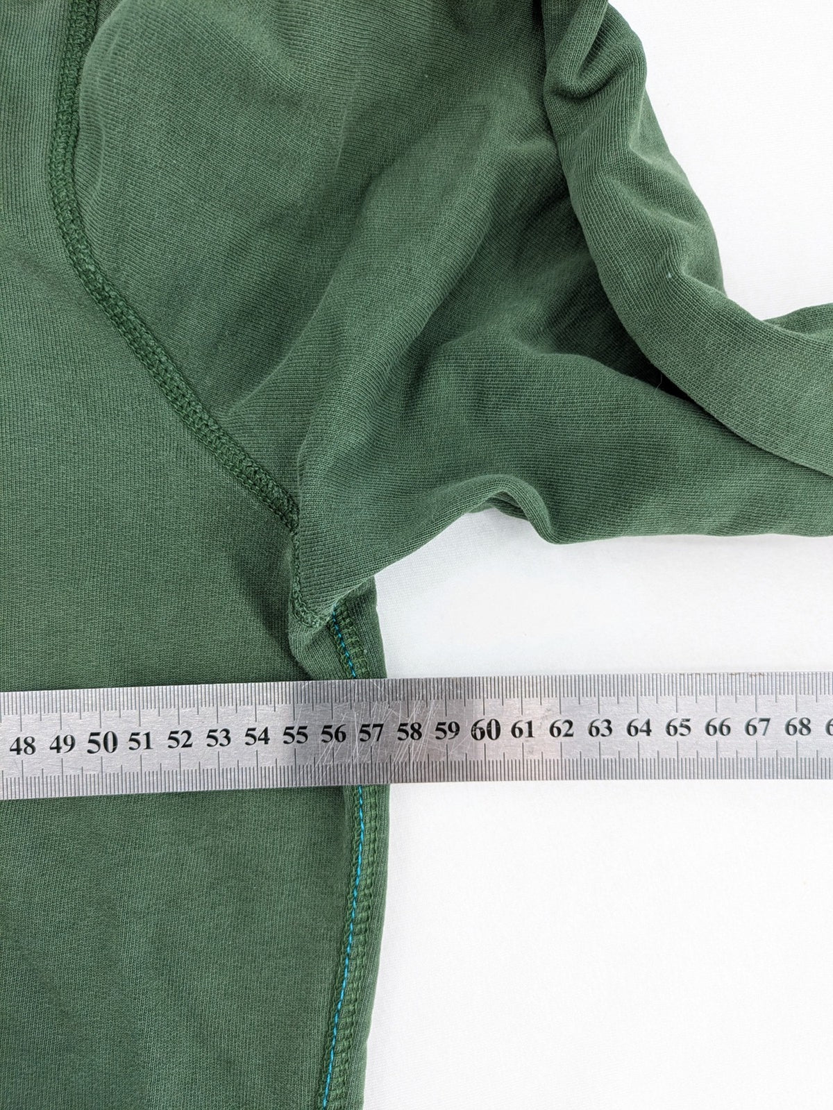 Tommy Hilfiger Denim green hoodie full zip with large graphic logo and grey waffle lining.
