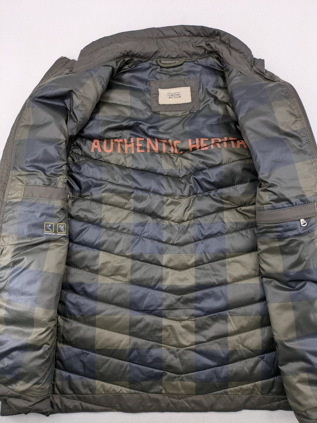 Camel Active khaki vest with full zip, quilted design, checkered lining, water-resistant.