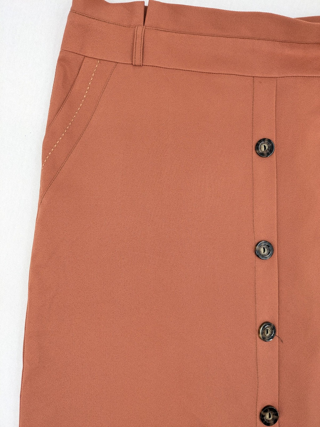 Moda orange long skirt A-line cut with front button placket and belt loops.