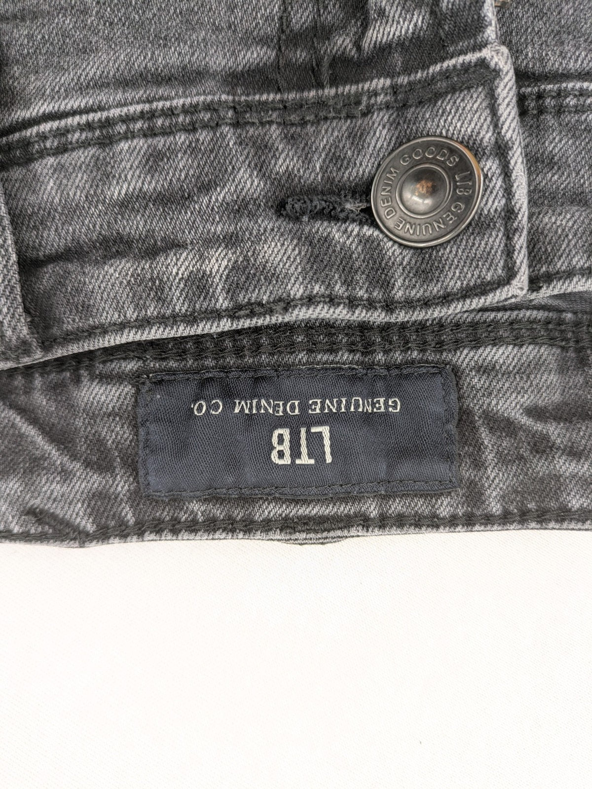 LTB grey slim tapered jeans with washed denim finish and subtle logo detail.