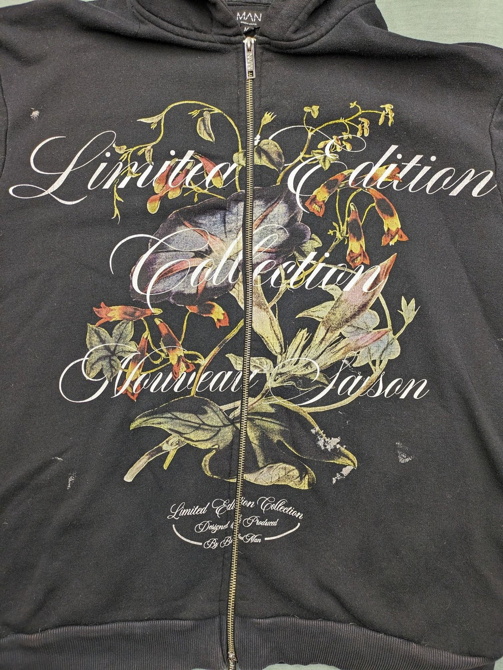 Boohooman zip-through hoodie black with floral graphic and "Limited Edition Collection" text.