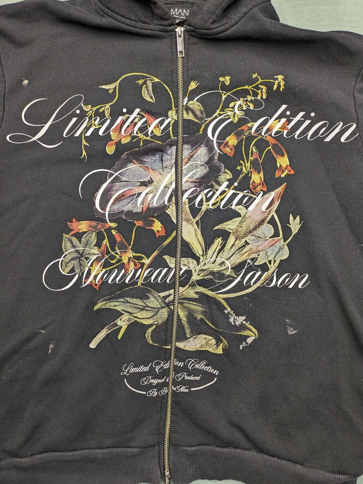 Boohooman zip-through hoodie black with floral graphic and "Limited Edition Collection" text.