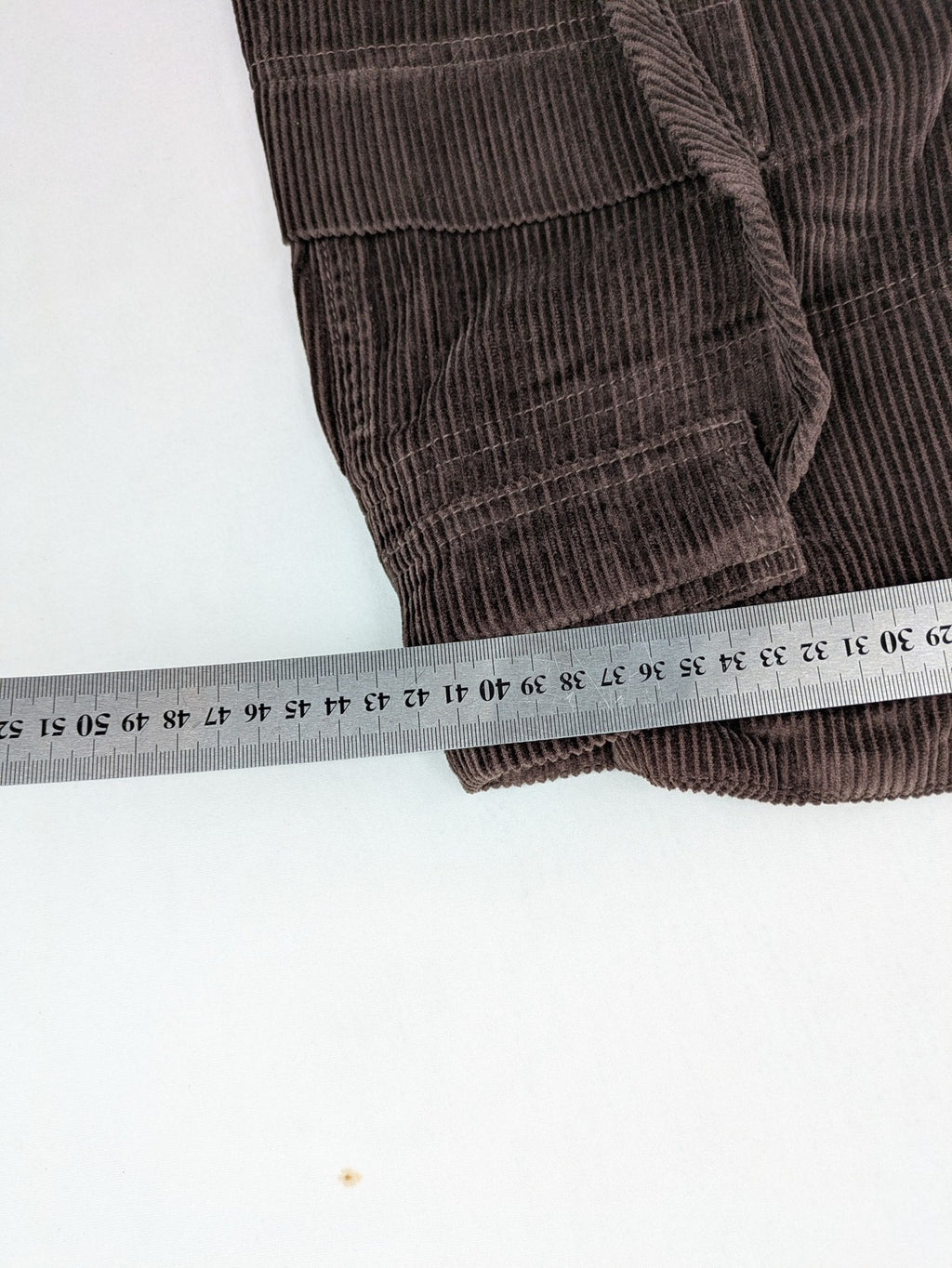 Alma & Lovis brown cord pants with drawstring, casual fit, and patch pockets.