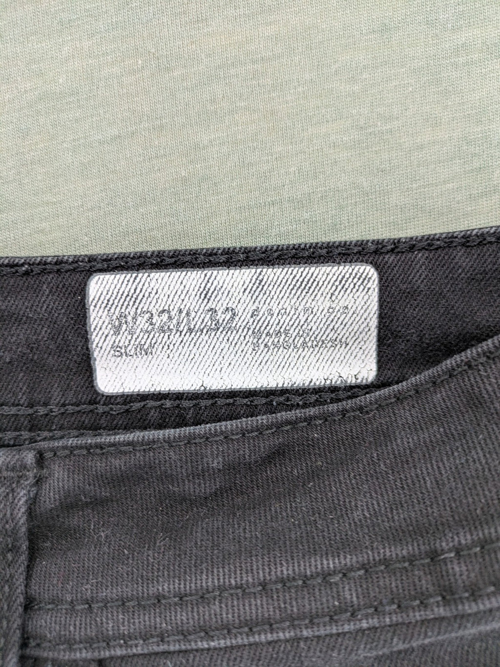 Denim & Co. grey slim fit jeans with button fly and classic 5-pocket design.